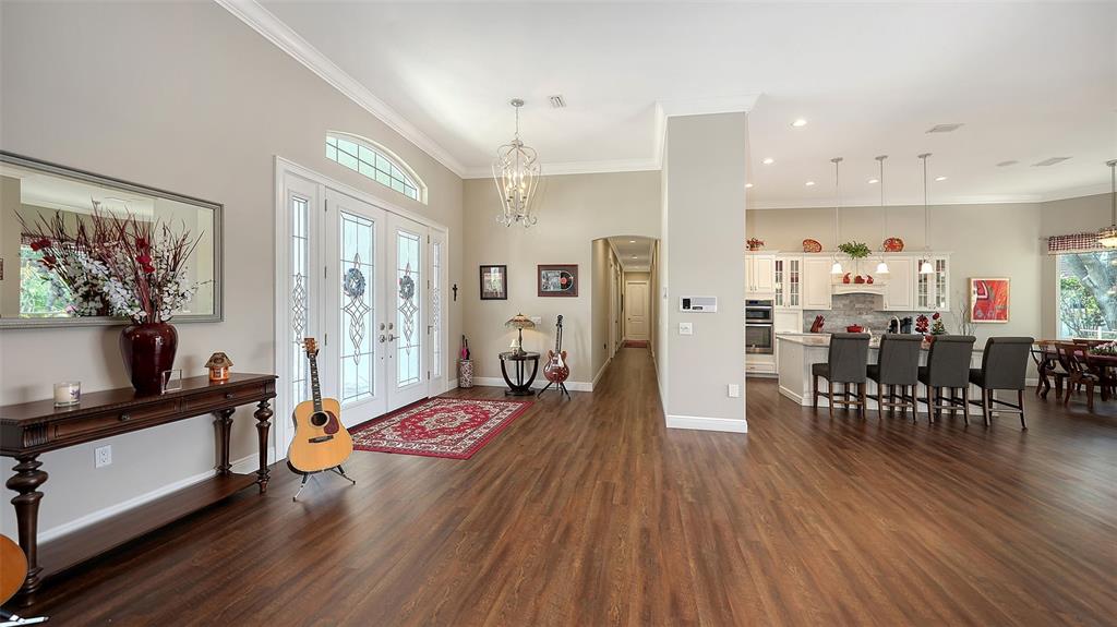 20 Bayhead Lane Osprey, FL 34229 - Photo 19 of 72 a living room with furniture and wooden floor