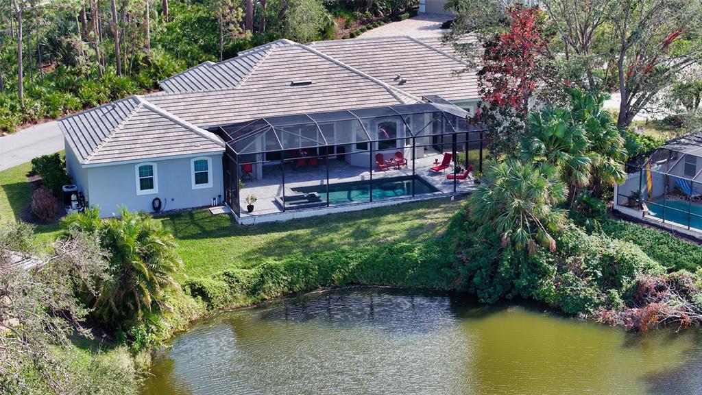 20 Bayhead Lane Osprey, FL 34229 - Photo 2 of 72 an aerial view of a house with swimming pool and a yard