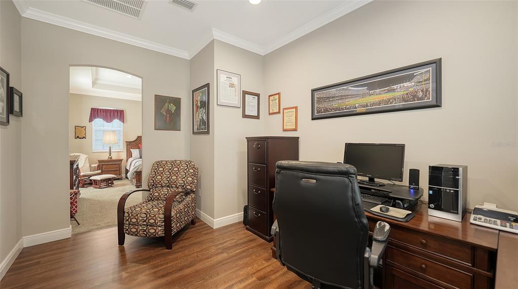 20 Bayhead Lane Osprey, FL 34229 - Photo 24 of 72 a living room with furniture and wooden floor