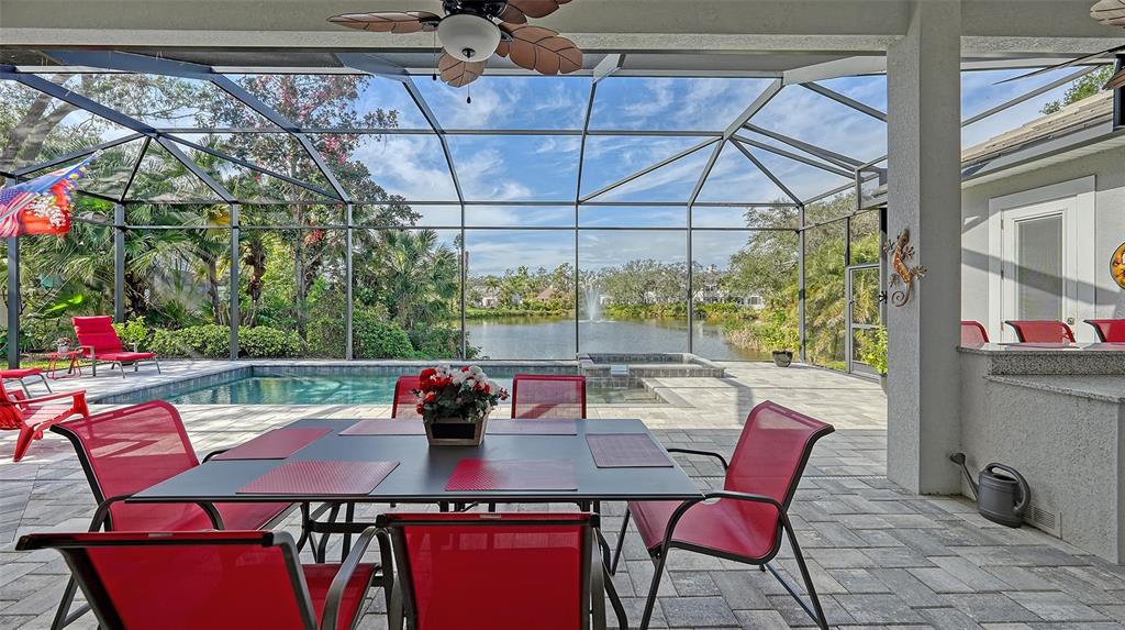 20 Bayhead Lane Osprey, FL 34229 - Photo 3 of 72 a view of a dining room with furniture window and outside view