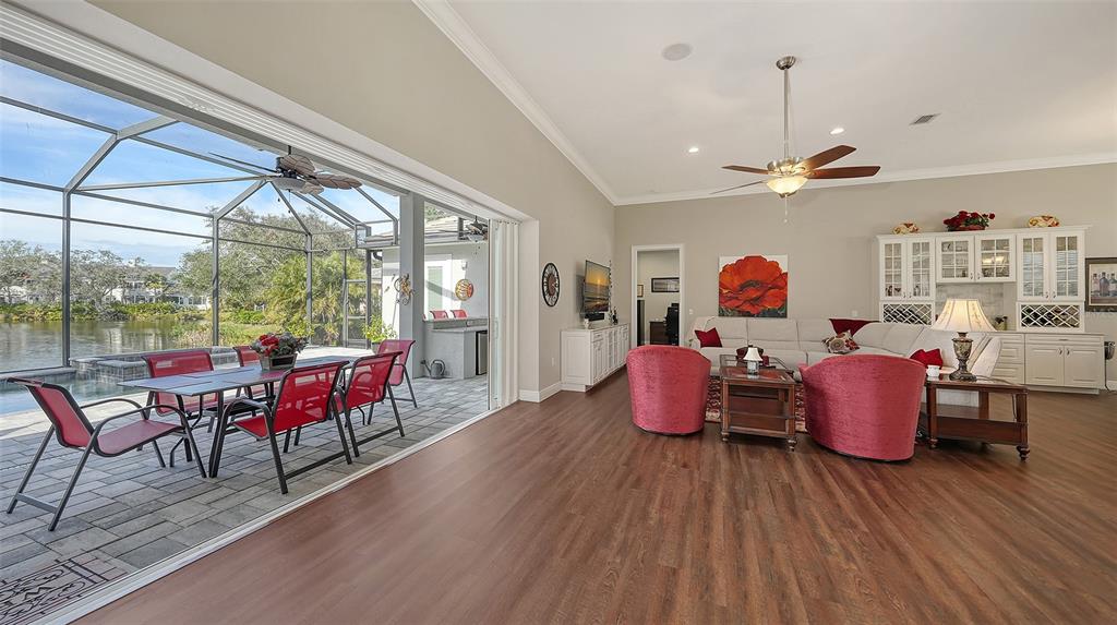 20 Bayhead Lane Osprey, FL 34229 - Photo 4 of 72 a living room with furniture and wooden floor