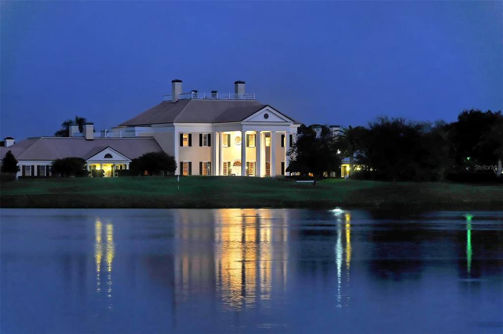 20 Bayhead Lane Osprey, FL 34229 - Photo 56 of 72 a front view of a house with a yard