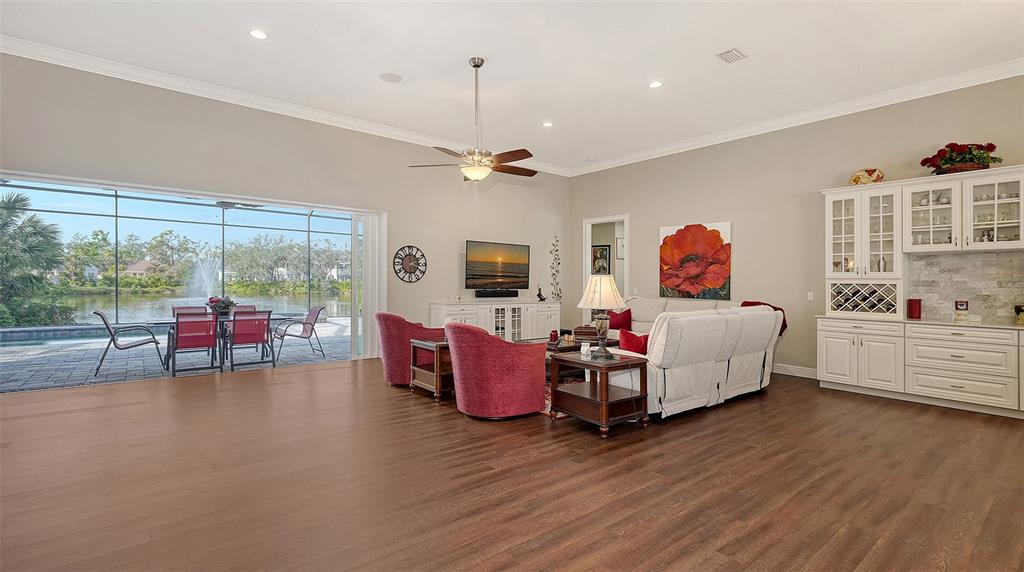 20 Bayhead Lane Osprey, FL 34229 - Photo 6 of 72 a living room with furniture and a large window