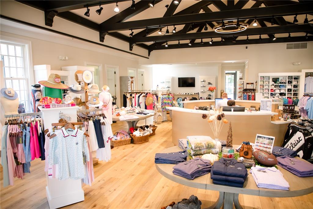 20 Bayhead Lane Osprey, FL 34229 - Photo 64 of 72 a living room with lots of furniture and a chandelier