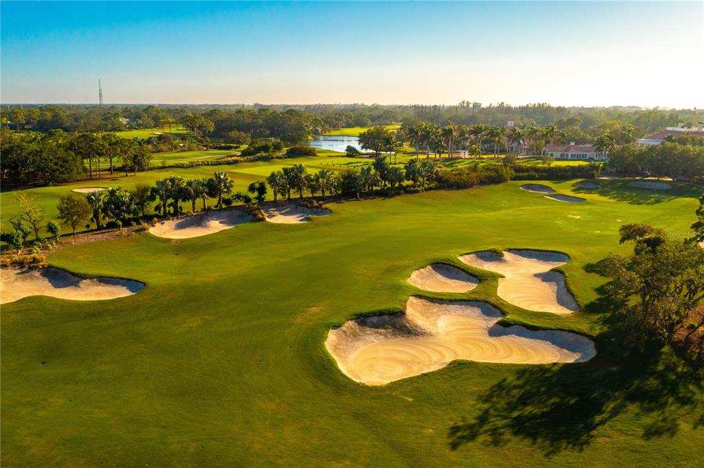 20 Bayhead Lane Osprey, FL 34229 - Photo 68 of 72 a view of a lake with a mountain
