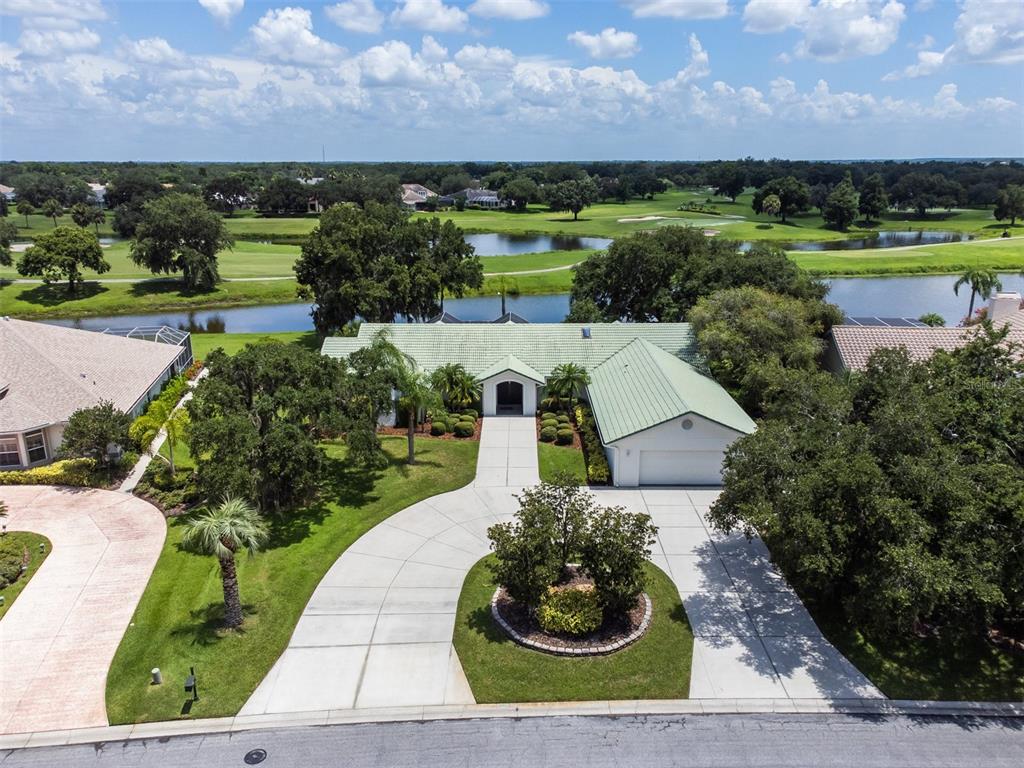 A large circular driveway welcomes you to this estate home.