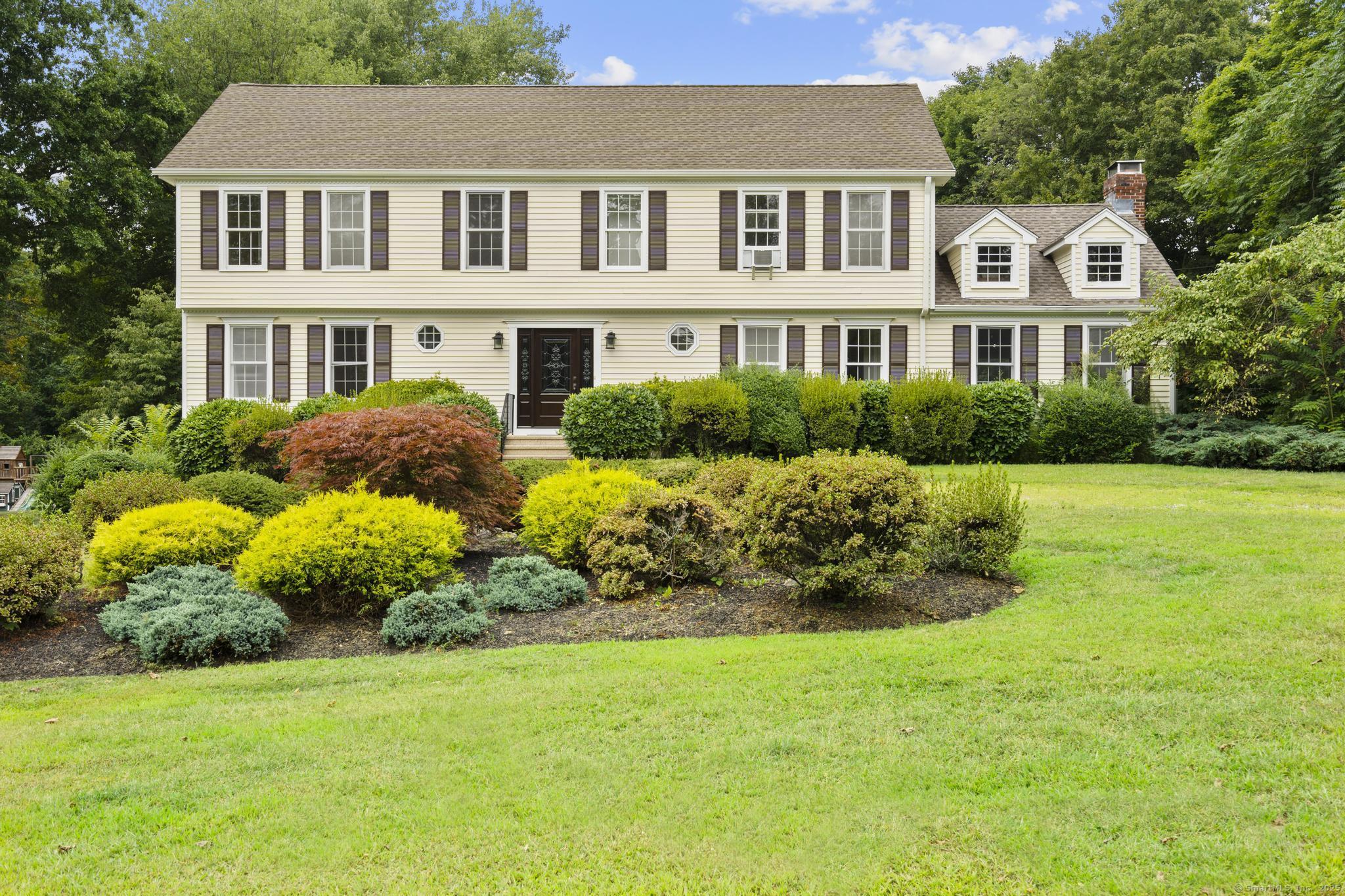 6 Cross Bow Lane Monroe, CT 06468 - Photo 1 of 1 a front view of house with yard and green space