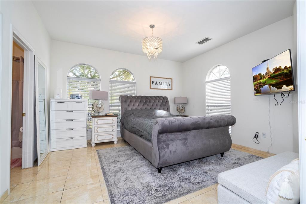 11410 Rapallo Lane Windermere, FL 34786 - Photo 22 of 62 a living room with furniture and a window