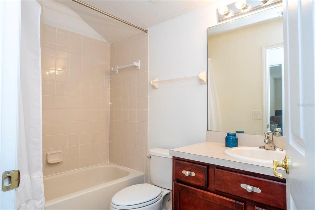11410 Rapallo Lane Windermere, FL 34786 - Photo 43 of 62 a bathroom with a sink a toilet and shower