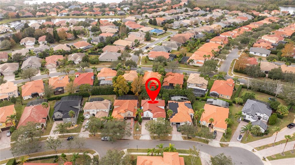 11410 Rapallo Lane Windermere, FL 34786 - Photo 5 of 62 an aerial view of residential houses with outdoor space and swimming pool
