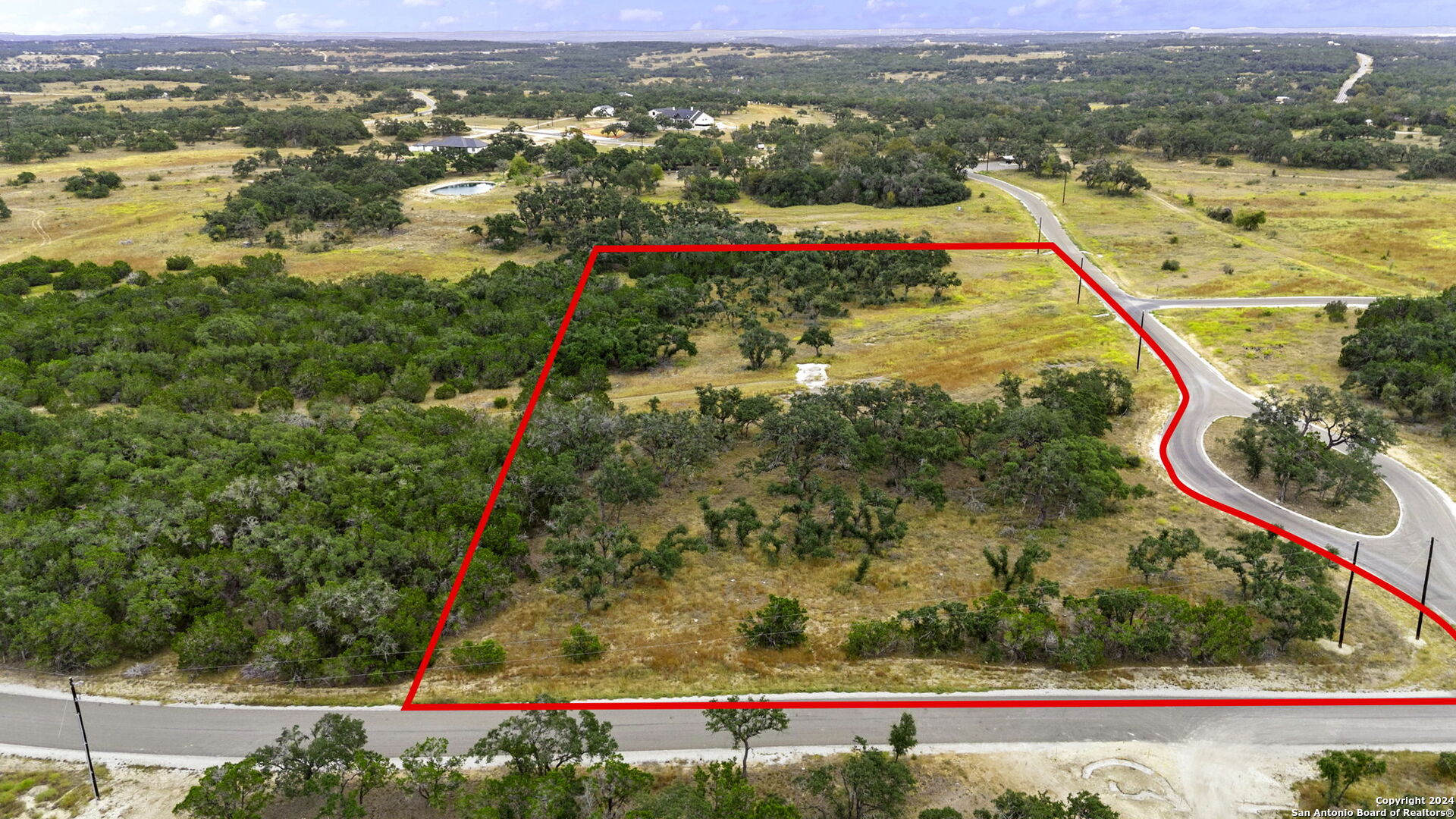 701 Windmill Ridge Blanco, TX 78606 - Photo 5 of 18 a view of a city from a balcony