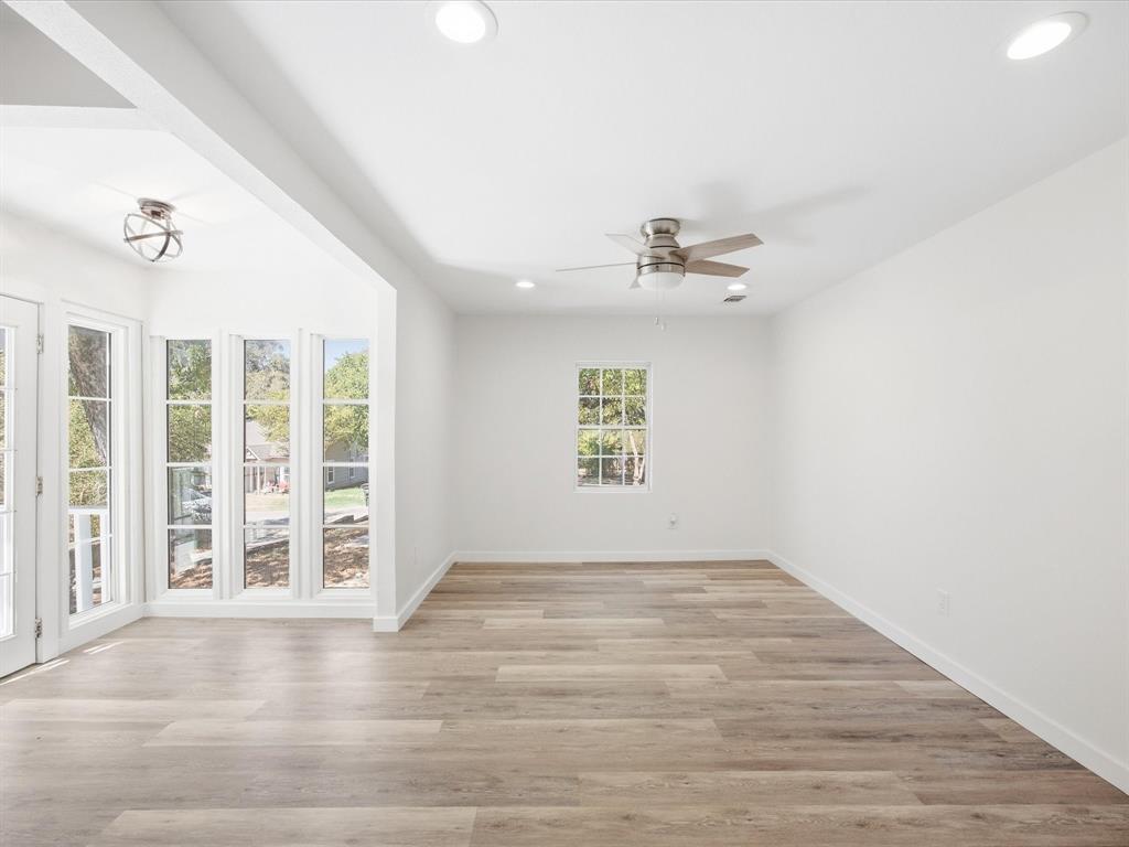 6933 Hatch Road Lake Worth, TX 76135 - Photo 7 of 28 Spacious room featuring wood-finish flooring, recessed lighting, and a ceiling fan