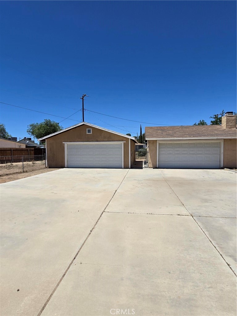 11876 Puye Road Apple Valley, CA 92308 - Photo 2 of 9 a house view with a outdoor space