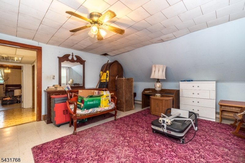 400 Mechlin Corner Road Pittstown, NJ 08867 - Photo 18 of 29 a living room with furniture and wooden floor