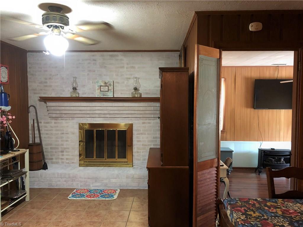 175 Cook Street Rural Hall, NC 27045 - Photo 5 of 17 Dining room with door leading into Den