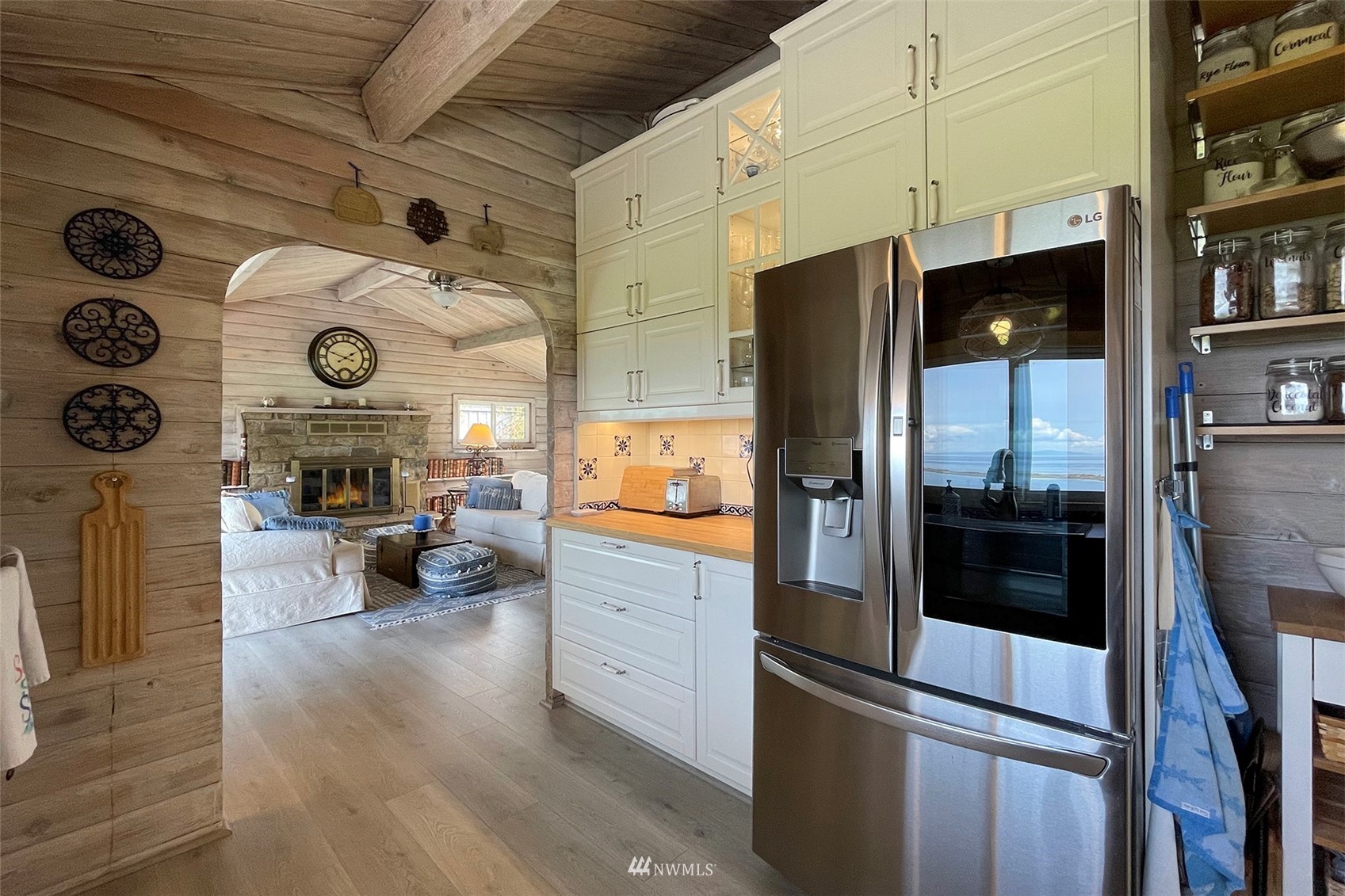 622 West Anderson Road Sequim, WA 98382 - Photo 12 of 40 a kitchen with stainless steel appliances a refrigerator a stove and a refrigerator