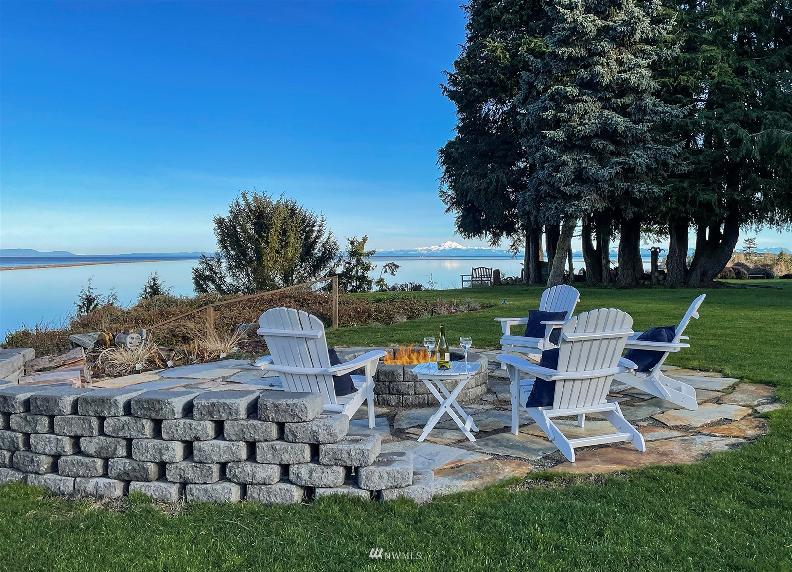 622 West Anderson Road Sequim, WA 98382 - Photo 34 of 40 a view of a table and chairs in the garden