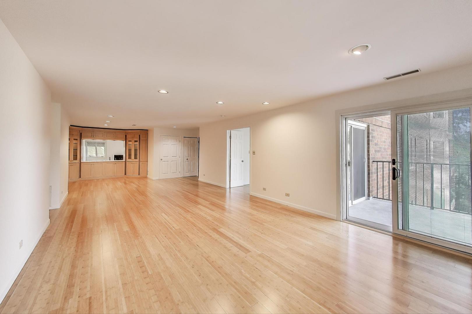 2720 Central Street, Unit 4C Evanston, IL 60201 - Photo 6 of 25 a view of empty room with wooden floor