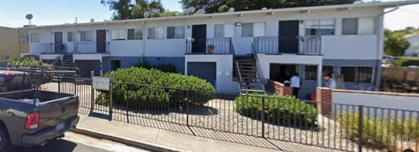 a house view with a outdoor space