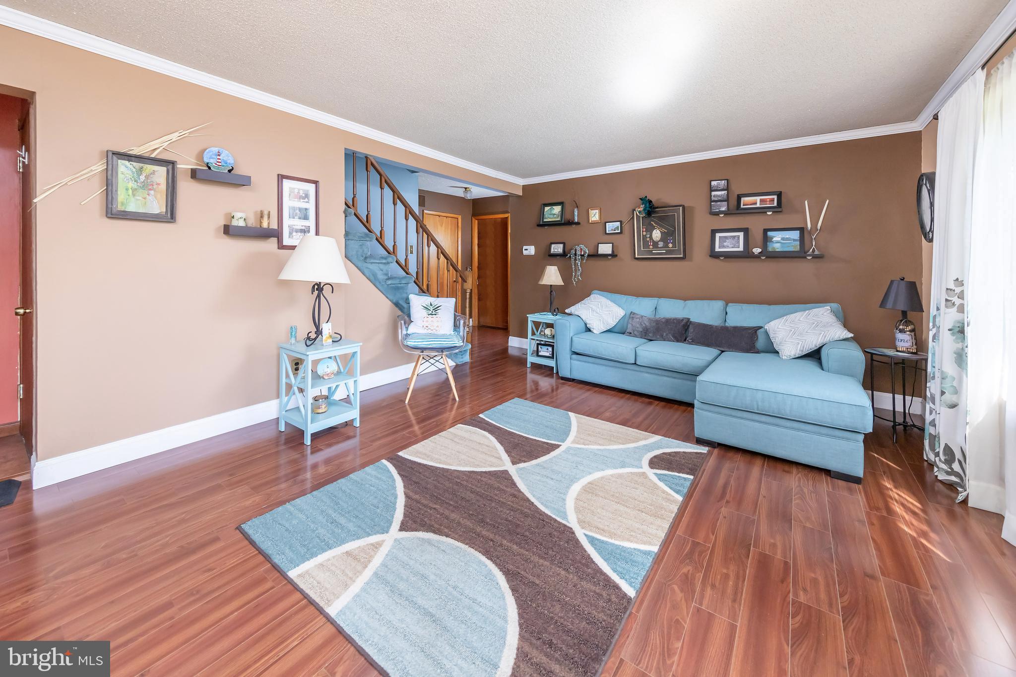 23 Randolph Road West Deptford, NJ 08096 - Photo 3 of 18 a living room with furniture and wooden floor