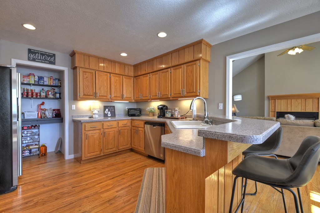 3725 Ada Street Blue Ridge, GA 30513 - Photo 13 of 75 a kitchen with granite countertop lots of counter top space and living room