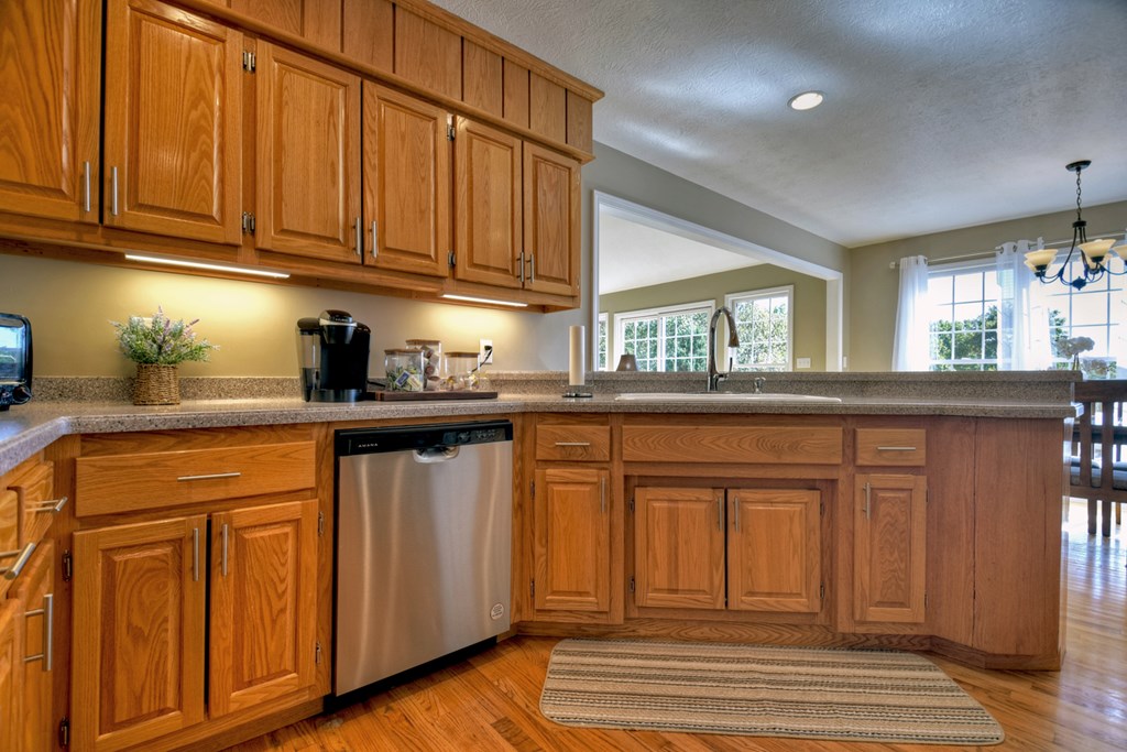 3725 Ada Street Blue Ridge, GA 30513 - Photo 17 of 75 a kitchen with stainless steel appliances granite countertop a refrigerator and a stove top oven