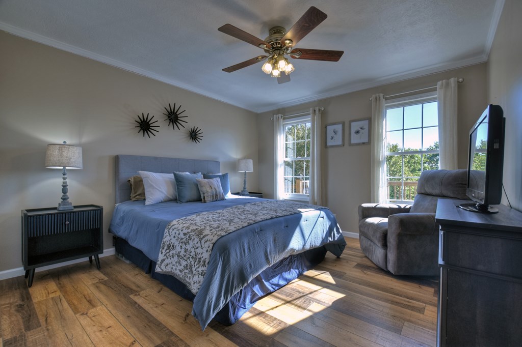 3725 Ada Street Blue Ridge, GA 30513 - Photo 19 of 75 a bedroom with a bed and a flat screen tv