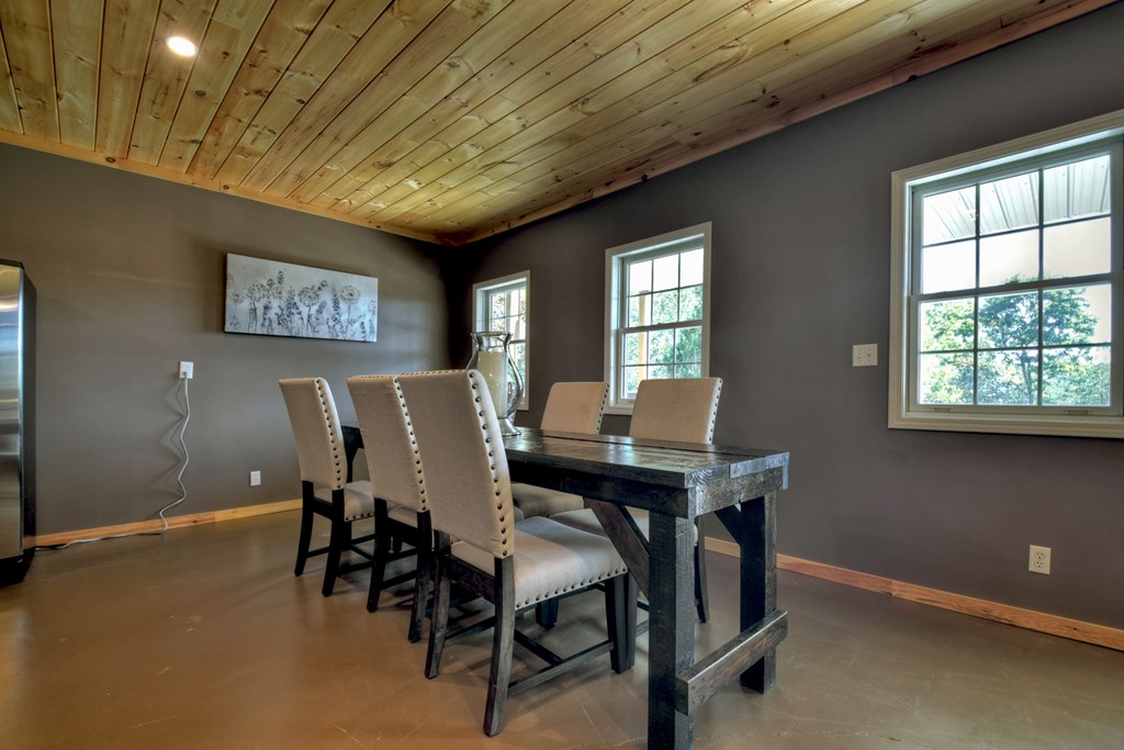 3725 Ada Street Blue Ridge, GA 30513 - Photo 30 of 75 a view of a dining room with furniture and window