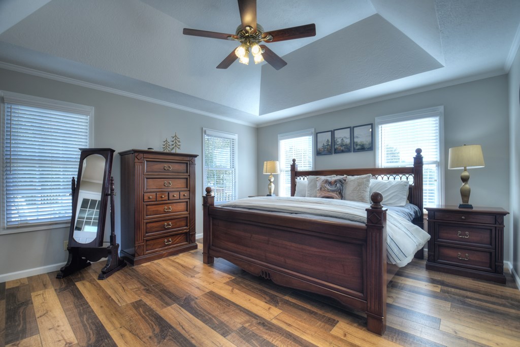 3725 Ada Street Blue Ridge, GA 30513 - Photo 37 of 75 a bedroom with bed and wooden floor