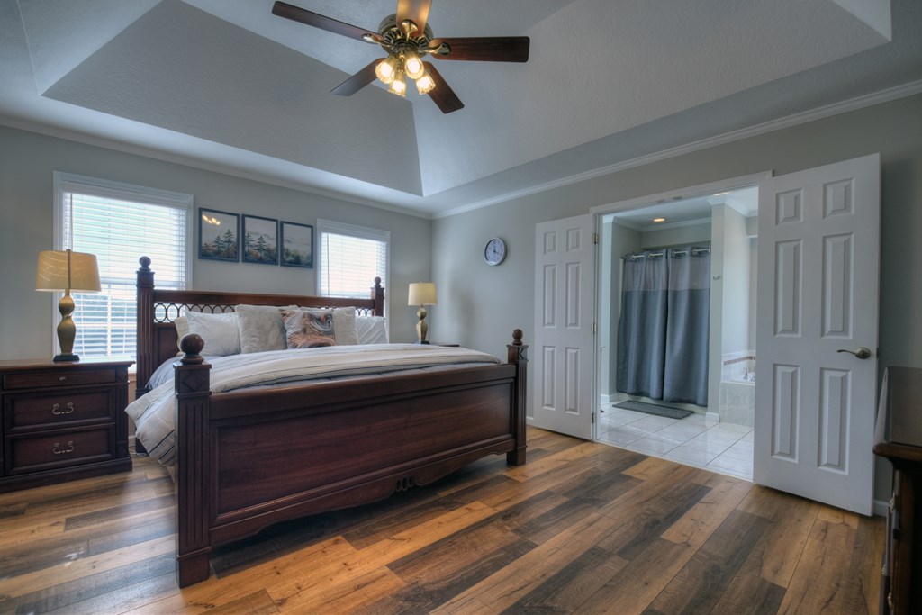 3725 Ada Street Blue Ridge, GA 30513 - Photo 38 of 75 a bedroom with bed and wooden floor