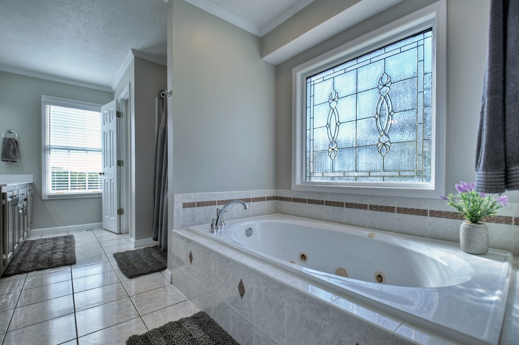 3725 Ada Street Blue Ridge, GA 30513 - Photo 41 of 75 a bathroom with a bathtub and a shower