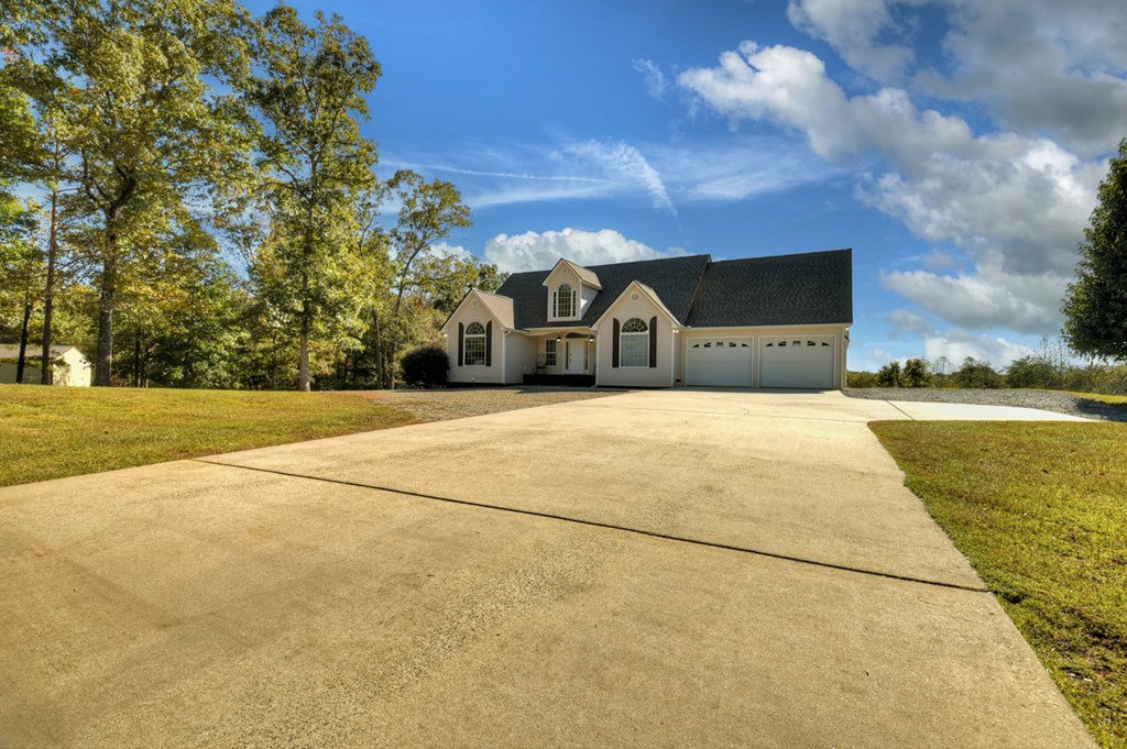3725 Ada Street Blue Ridge, GA 30513 - Photo 43 of 75 a view of a house with a yard