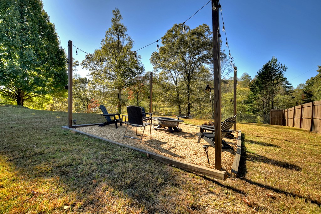 3725 Ada Street Blue Ridge, GA 30513 - Photo 44 of 75 a view of a backyard with sitting area