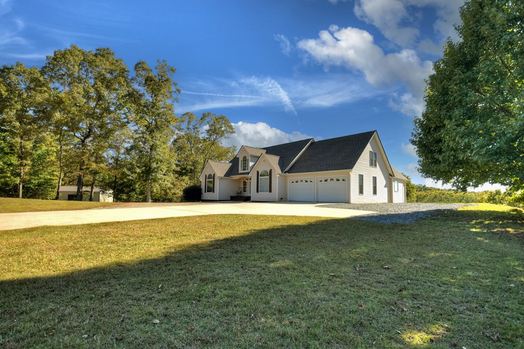 3725 Ada Street Blue Ridge, GA 30513 - Photo 46 of 75 a view of an house with backyard space and balcony