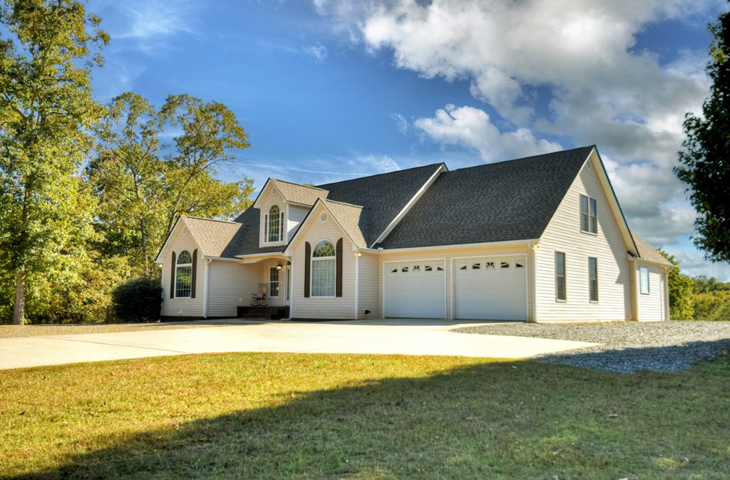 3725 Ada Street Blue Ridge, GA 30513 - Photo 47 of 75 a front view of a house with a yard