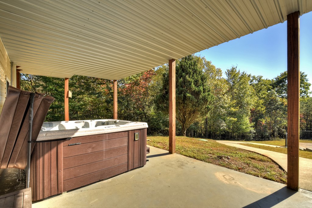 3725 Ada Street Blue Ridge, GA 30513 - Photo 51 of 75 a view of a backyard with a tub and sink