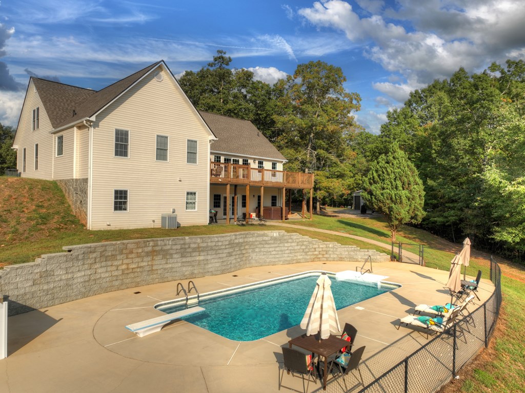3725 Ada Street Blue Ridge, GA 30513 - Photo 55 of 75 a view of a patio with swimming pool