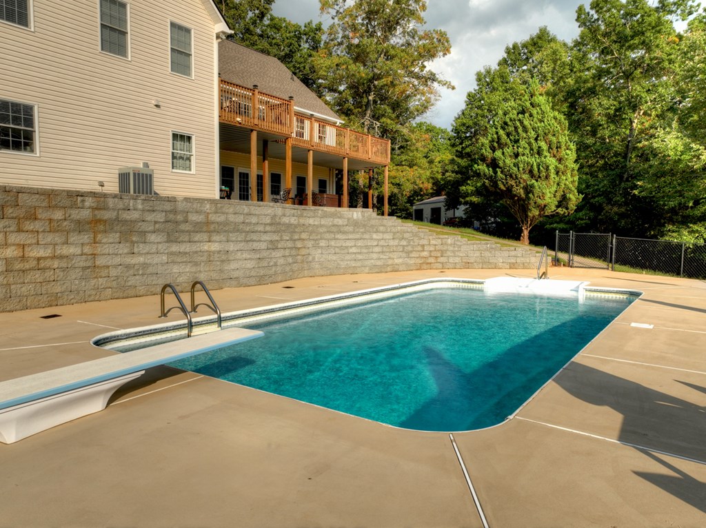 3725 Ada Street Blue Ridge, GA 30513 - Photo 56 of 75 a view of a swimming pool with a patio