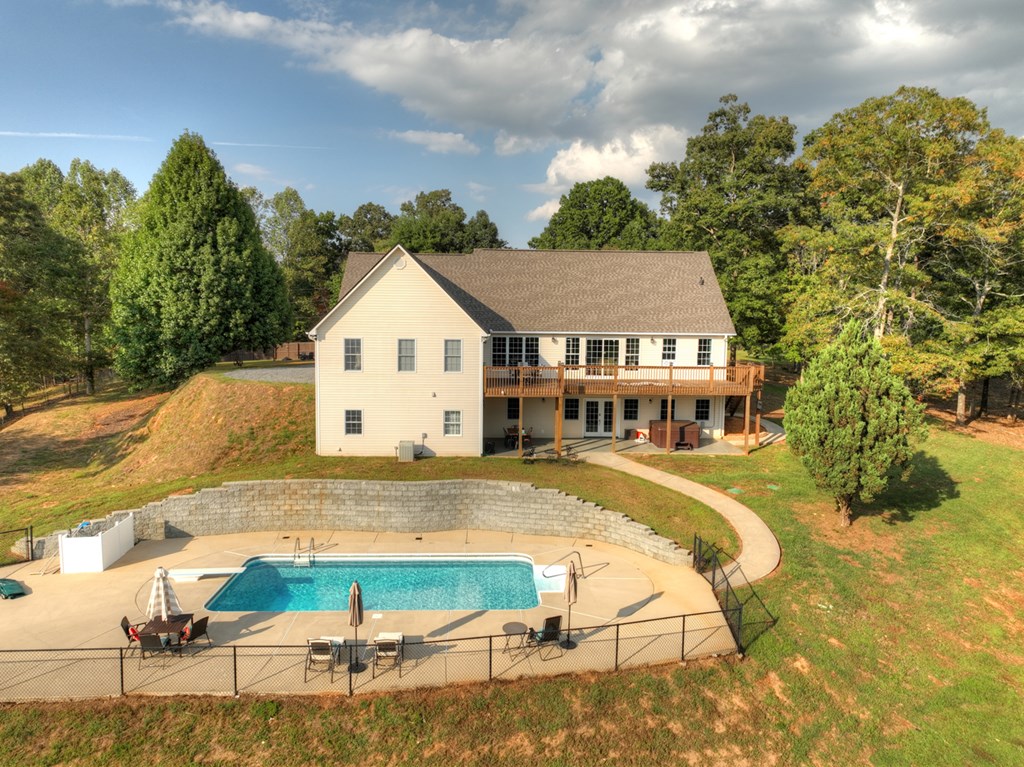 3725 Ada Street Blue Ridge, GA 30513 - Photo 58 of 75 a view of house with backyard and swimming pool