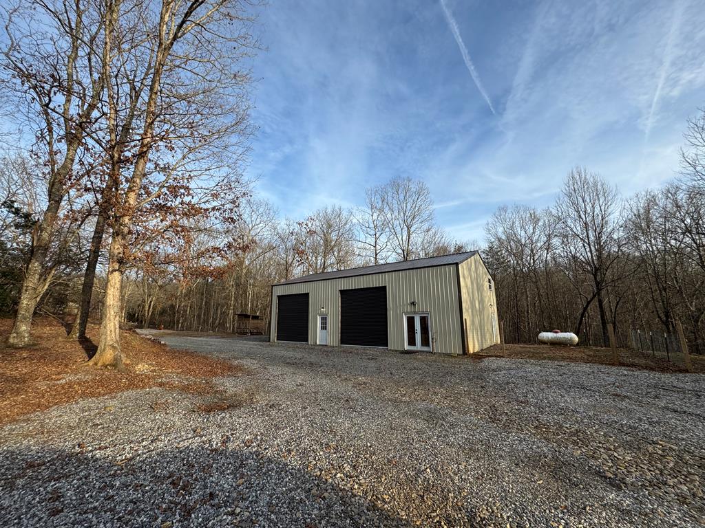 3725 Ada Street Blue Ridge, GA 30513 - Photo 75 of 75 a view of a house with a yard