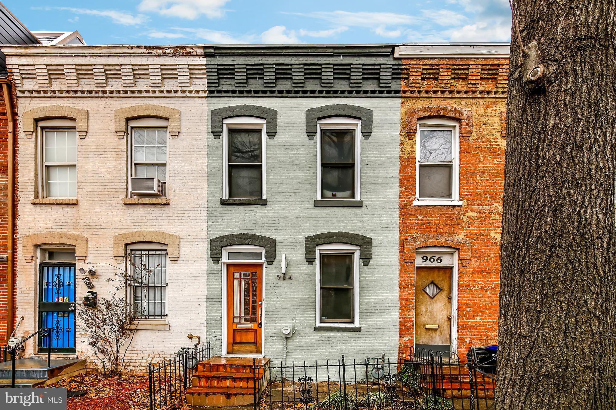 a front view of a building with many windows