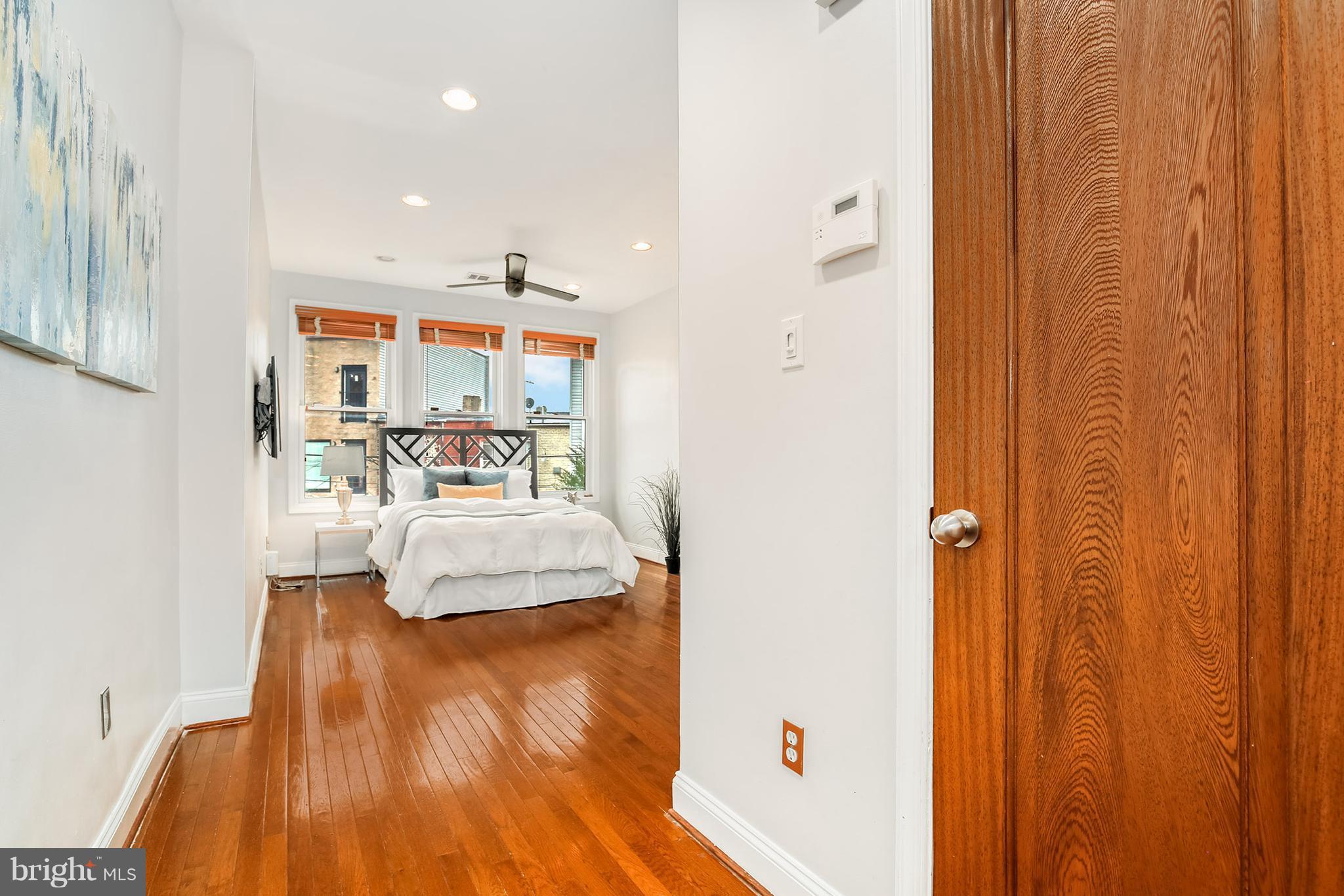 964 Florida Avenue Northwest Washington, DC 20001 - Photo 19 of 27 a bedroom with a bed and a view of bedroom