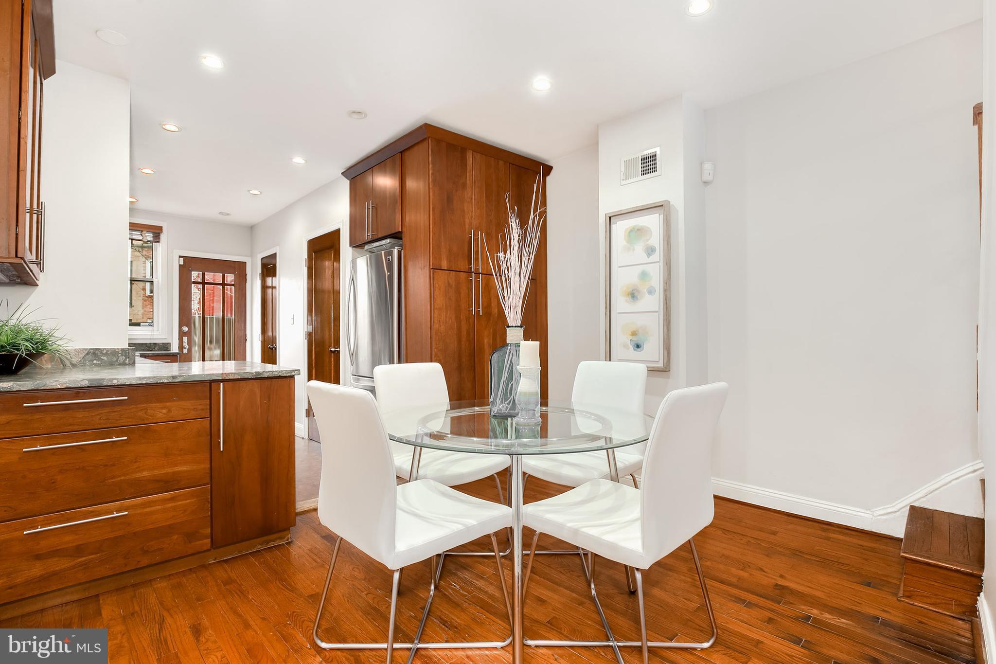 964 Florida Avenue Northwest Washington, DC 20001 - Photo 7 of 27 a view of a dining room with furniture and wooden floor
