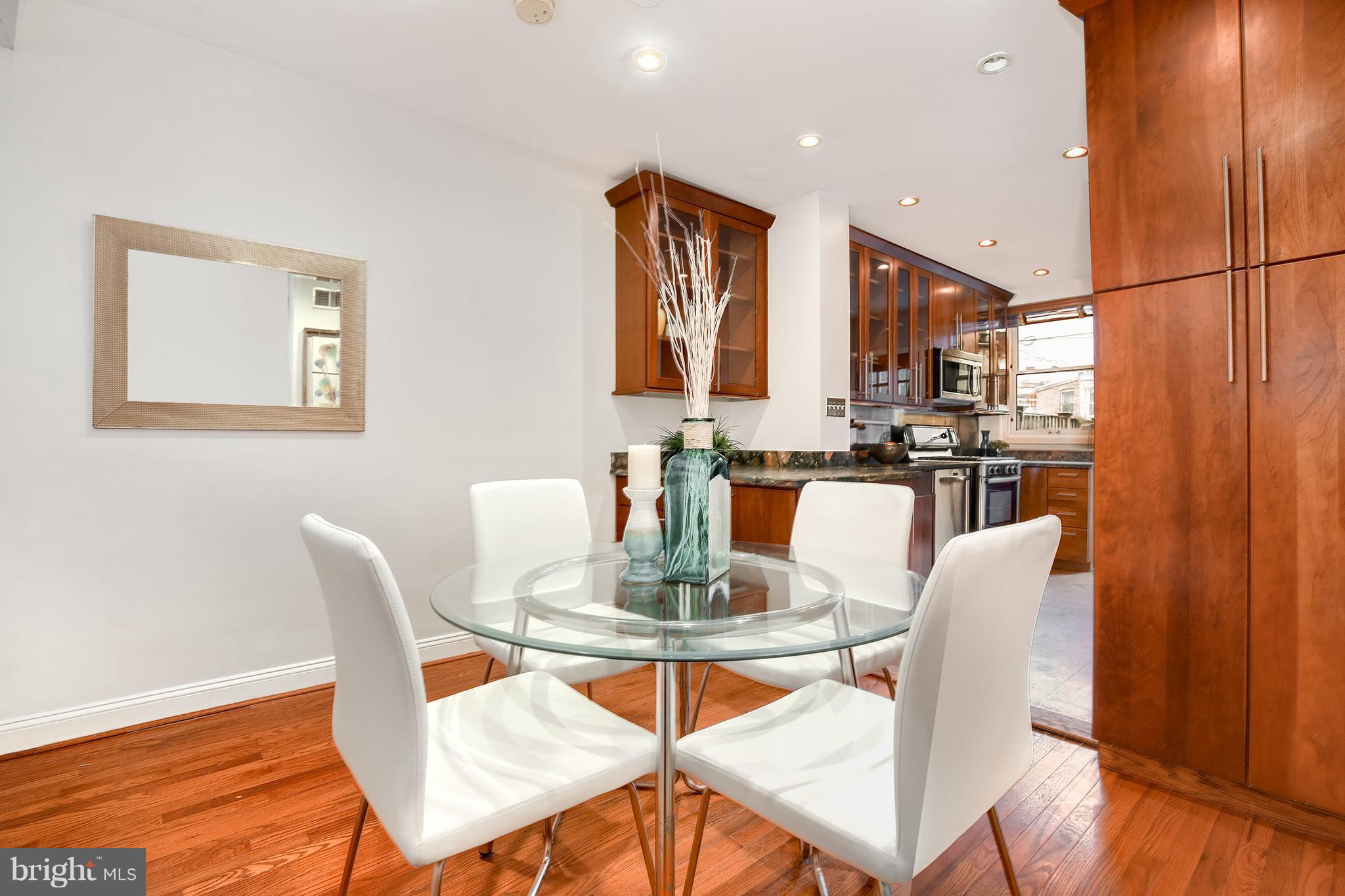 964 Florida Avenue Northwest Washington, DC 20001 - Photo 9 of 27 a dining room with furniture and wooden floor