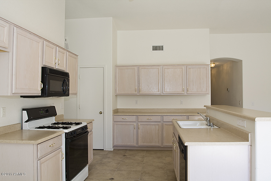 1609 East Greenway Road Phoenix, AZ 85042 - Photo 9 of 24 Island and Tons of Cabinet Space