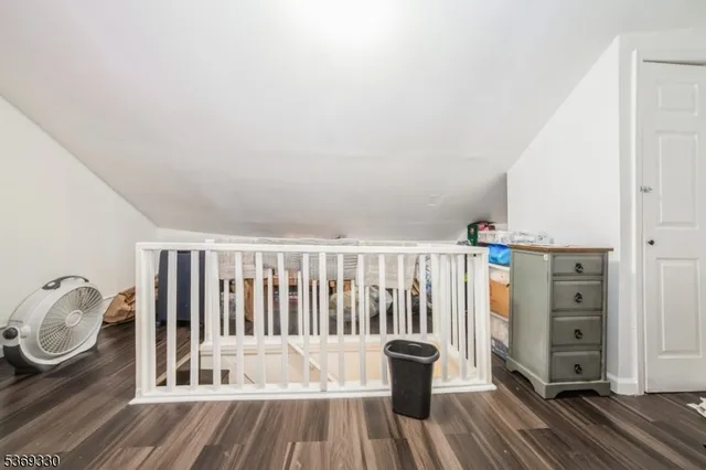 a view of wooden floor and chair