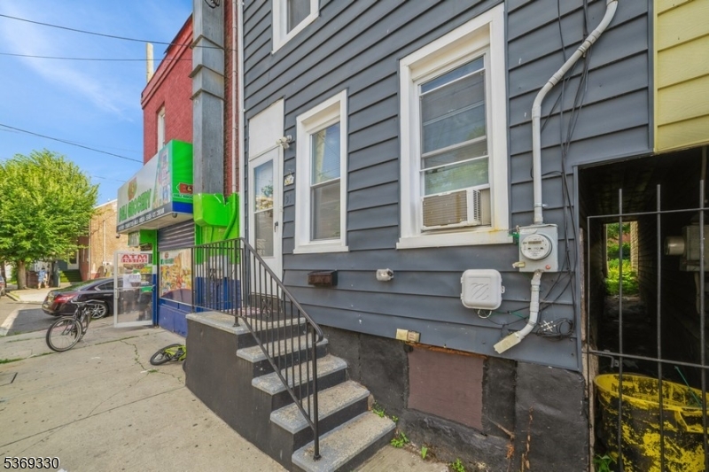 31 Bellevue Avenue Trenton, NJ 08618 - Photo 18 of 21 a front view of a house with outdoor seating