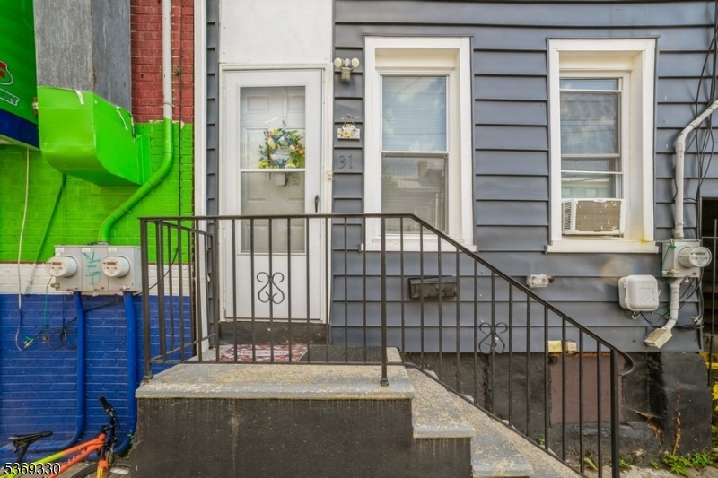 31 Bellevue Avenue Trenton, NJ 08618 - Photo 19 of 21 a view of a balcony with a potted plant