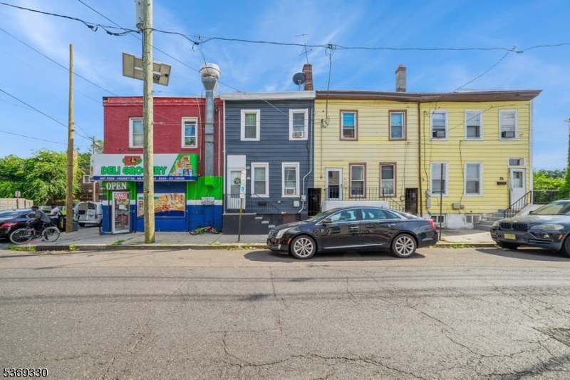 31 Bellevue Avenue Trenton, NJ 08618 - Photo 20 of 21 a car parked in front of a building