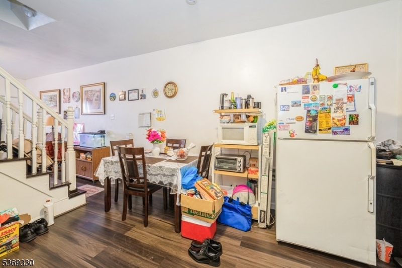 31 Bellevue Avenue Trenton, NJ 08618 - Photo 5 of 21 a room with furniture and wooden floor